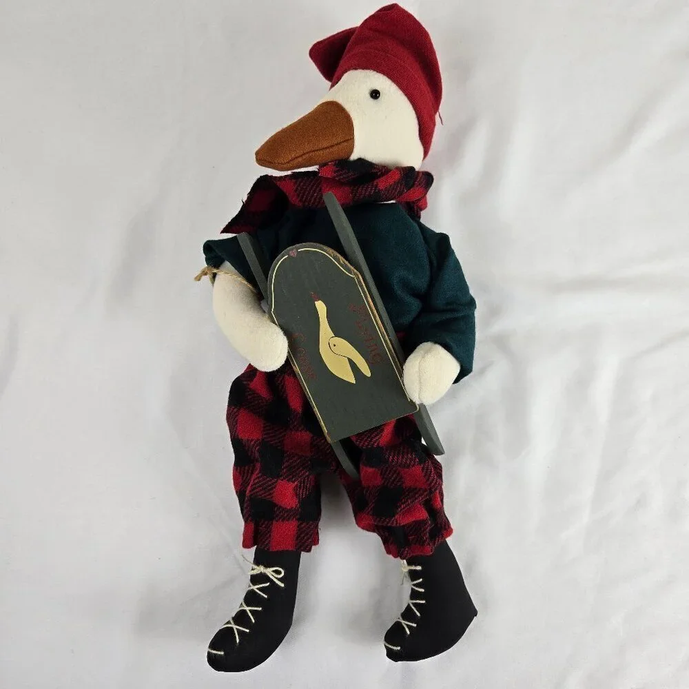 Stuffed Goose in Winter Attire Holding 